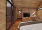 Ξύλινα εσωτερικά σύγχρονα Prefab σπίτια 24 τετραγωνικό μέτρο ένα μορφωματικό σπίτι κρεβατοκάμαρων